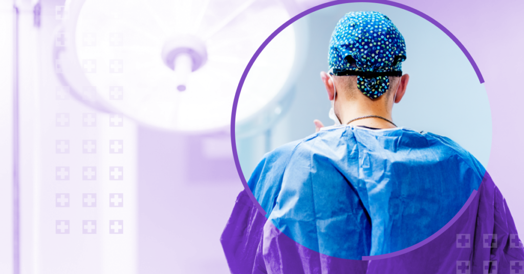 View of the back of a surgeon in the OR.